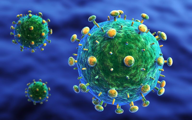 A computer generated, simplified representation of HIV particles. The viral envelope membrane is green and the envelope protein is yellow. Photo: BioMedical, Shutterstock